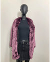 Mannequin wearing a lavender v-neck faux fur coat over a black outfit on a plain background. SpiritHoods Online Sample Sale Style: Luxe V-Neck Faux Fur Coat in Lavender Wolf in Size X-SMALL.