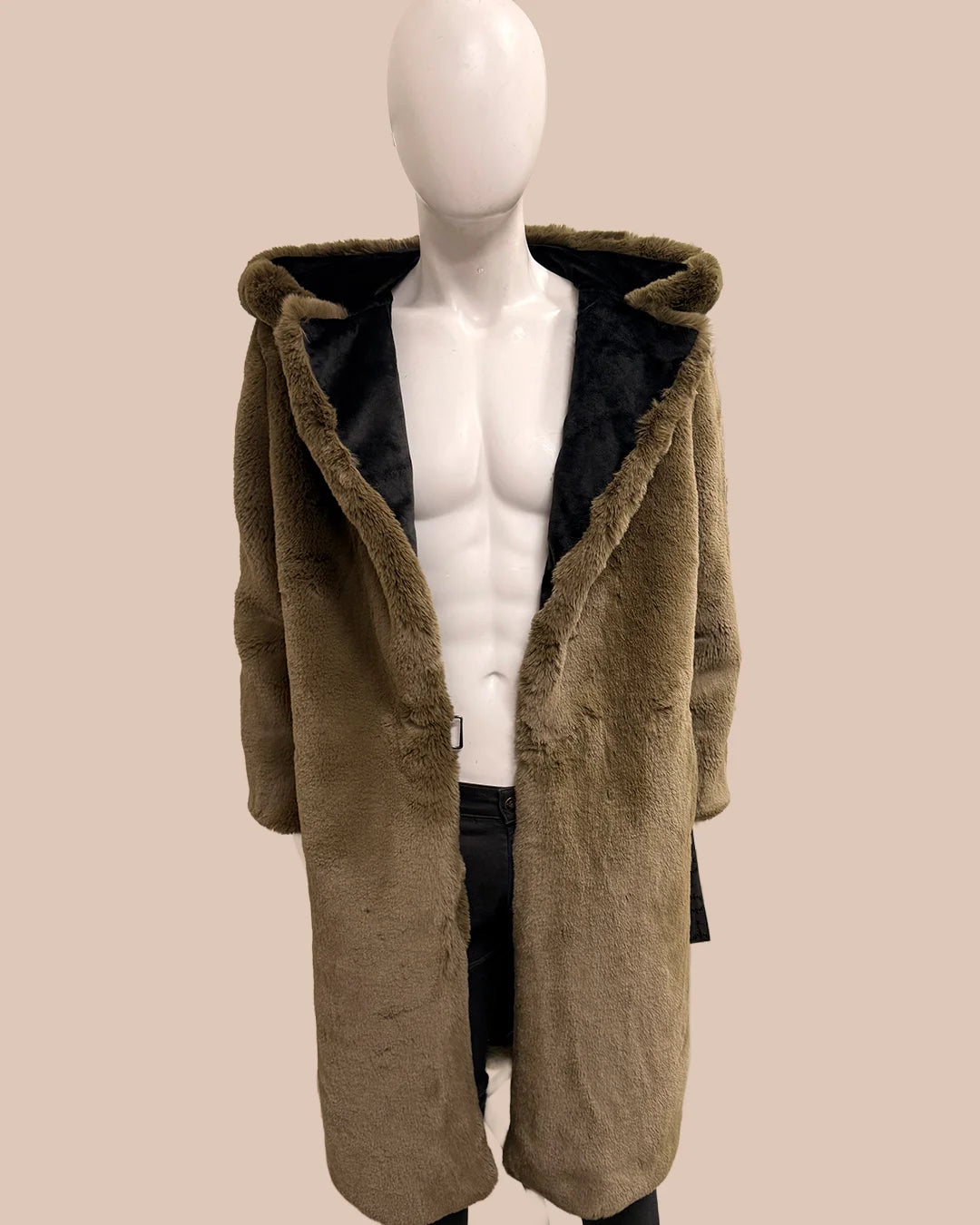 Mannequin wearing a army green teddy coat on a beige background