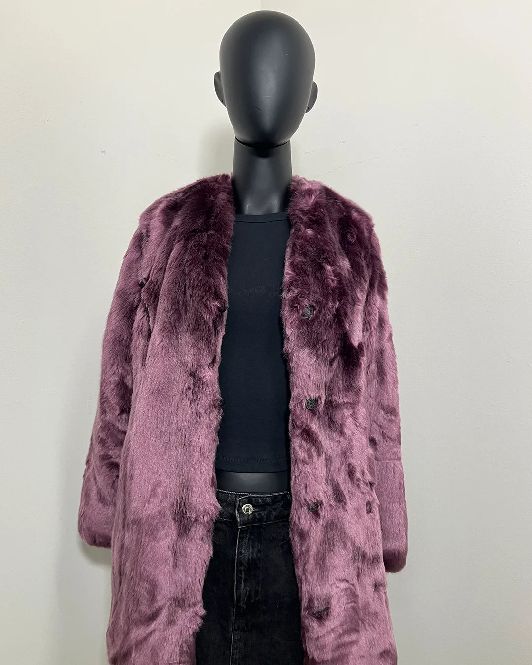 Mannequin wearing a purple faux fur coat against a plain background - showing a loose open relaxed fit, without utilizing the buttons. SpiritHoods Online Sample Sale Style: Luxe V-Neck Faux Fur Coat in Lavender Wolf in Size X-SMALL.