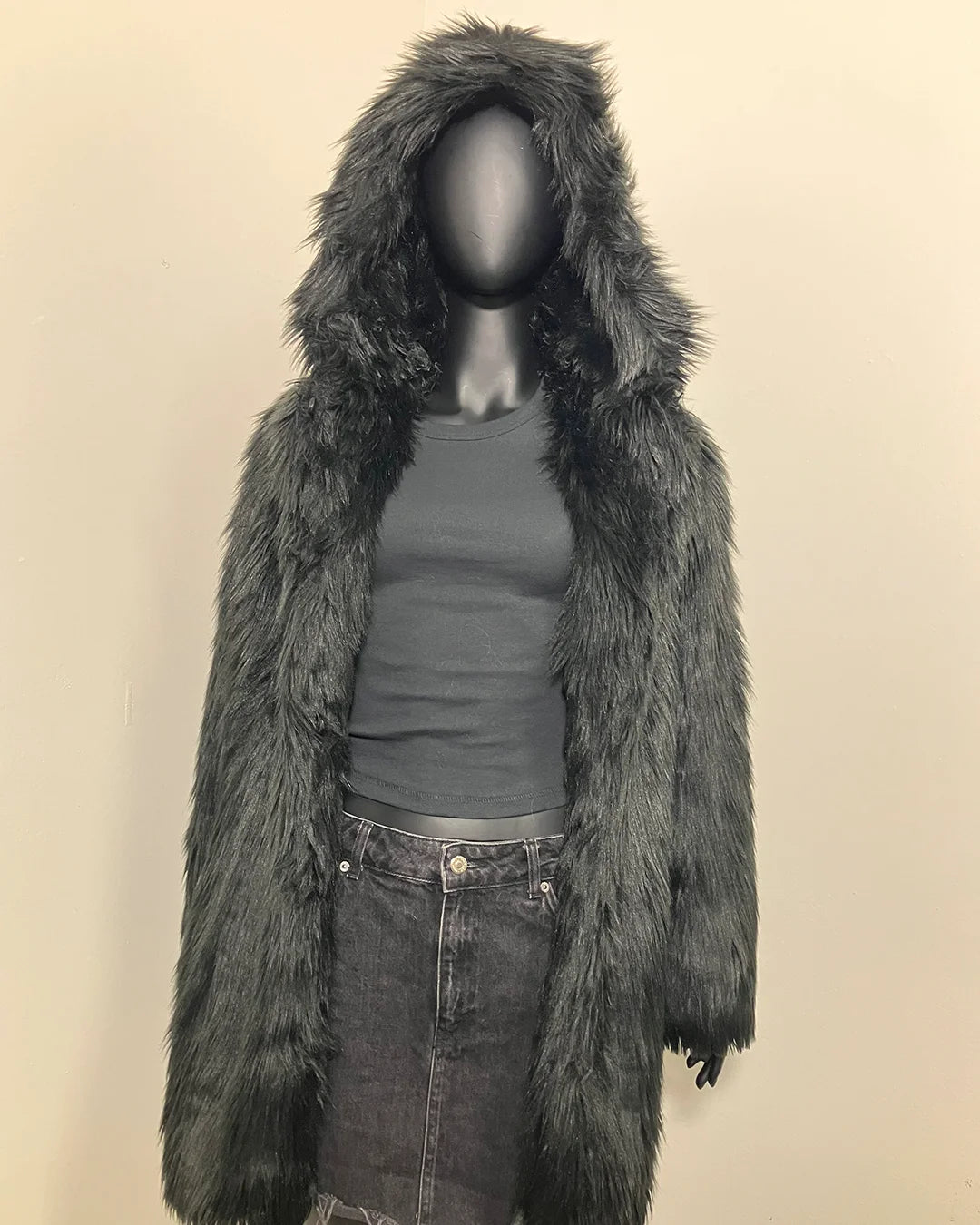Mannequin wearing a black faux fur fur coat with hood - SpiritHoods Online Sample Sale Hooded Black Faux Fur Coat - Black Wolf in size MEDIUM 