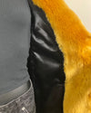 close up photo of the black poly-satin lining of the golden wolf v-neck luxe faux fur coat. SpiritHoods Online Sample Sale Style: Luxury V-Neck Faux Fur Coat in Golden Wolf size X-SMALL.