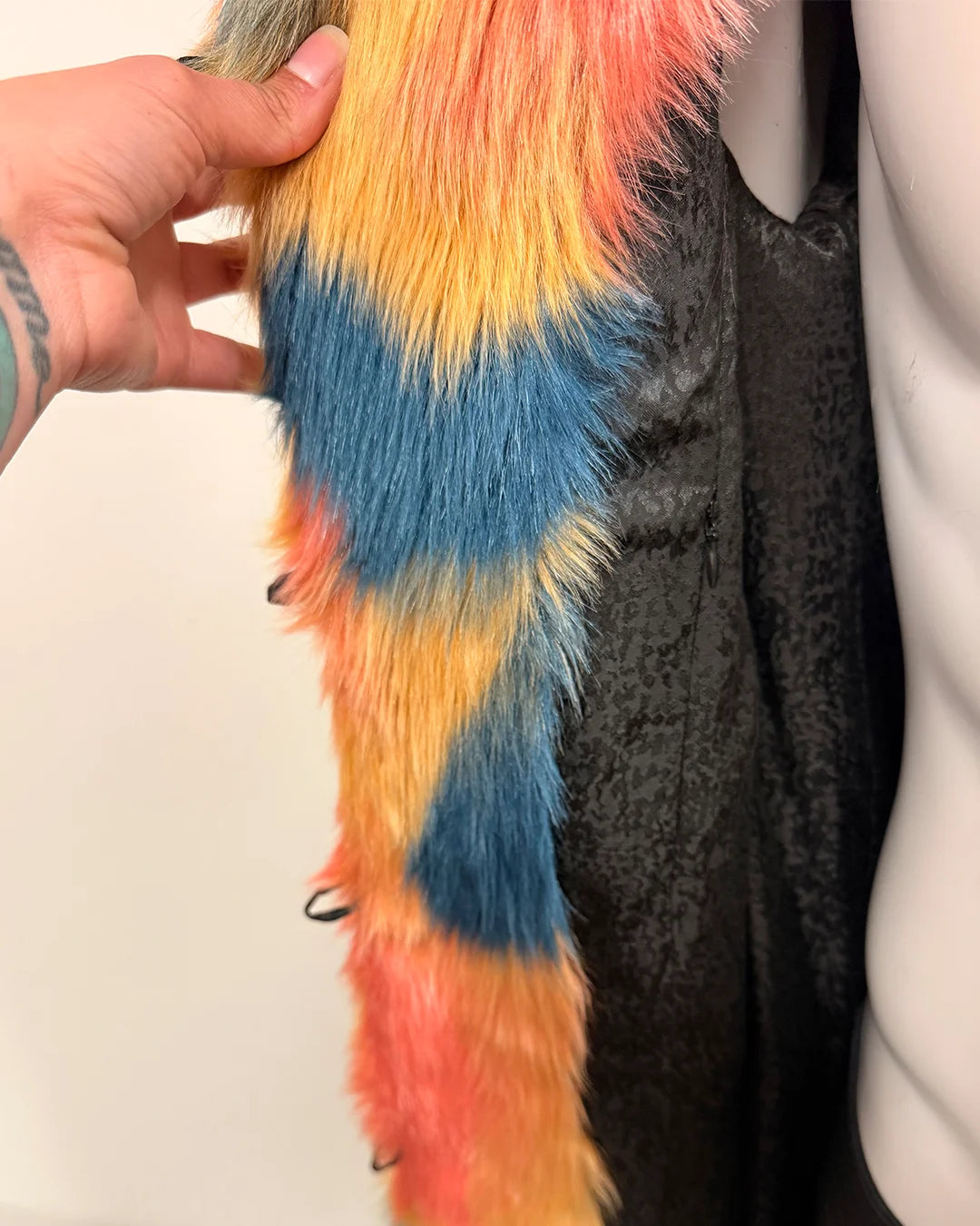 Multicolored fake fur coat - showing inner black snakeskin lining and secret zipper pocket