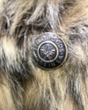 Close-up of the buttons on the cheetah faux fur coat, showcasing a branded SpiritHoods Made In L.A. button on the plush cheetah fake fur jacket