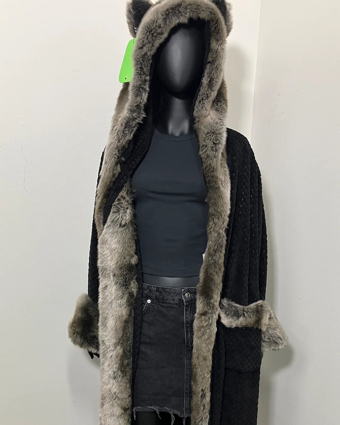 black mannequin wearing spirithoods original grey wolf classic luxury robe prototype with the original clouded black body fabric
