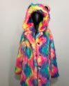 Multicolored rainbow tie dye faux fur coat on a mannequin against a plain background