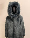 Gray/blue fake fur coat with hood on a beige background