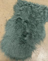 Teal shaggy faux fur rug 