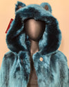 Blue faux fur coat with hood on a beige background, showing up close photo of the plush fake fur & oversized hood