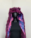 Mannequin wearing a colorful fake fur trimmed double-plush-lined hood against a plain background