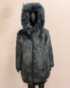 Gray/blue faux fur coat with hood on a beige background