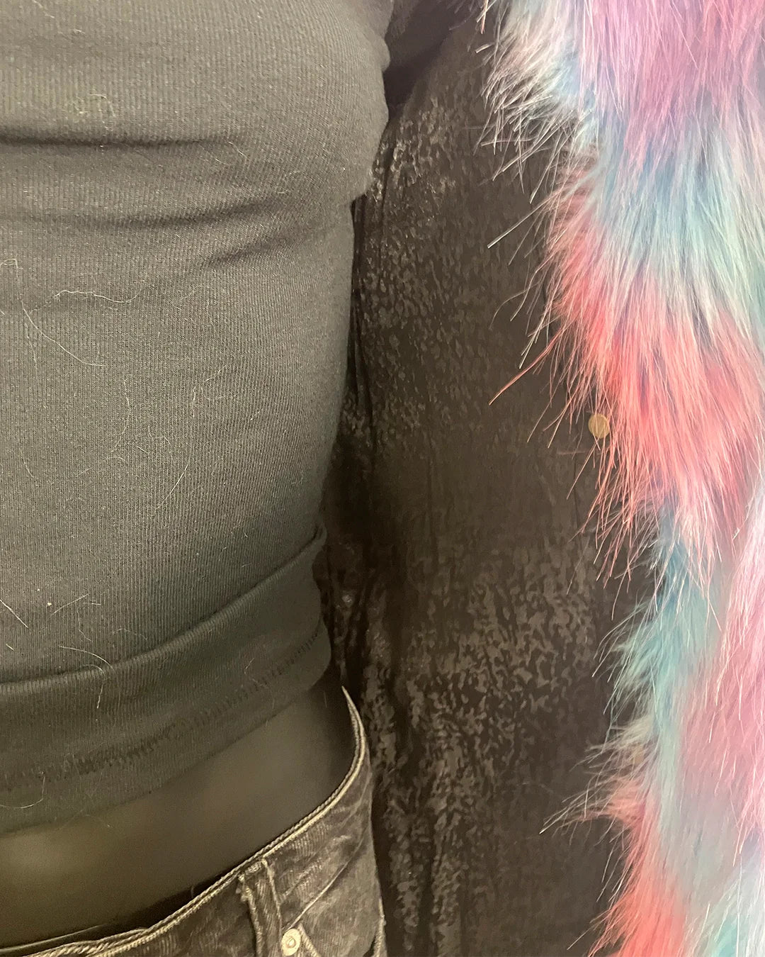 close-up photo of the black lining on the SpiritHoods Online Sample Sale Style: Classic Faux Fur Coat in Cotton Candy Bear in size X-SMALL.
