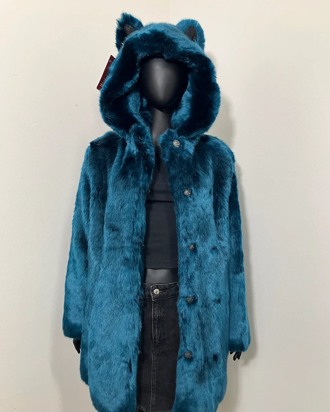 Luxe Royal Blue Faux Fur Coat on a mannequin with an oversized hood + wolf ears, and wolf peacoat button closure. SpiritHoods Online Sample Sale Style: Classic Luxe Faux Fur Coat in Royal Wolf size MEDIUM