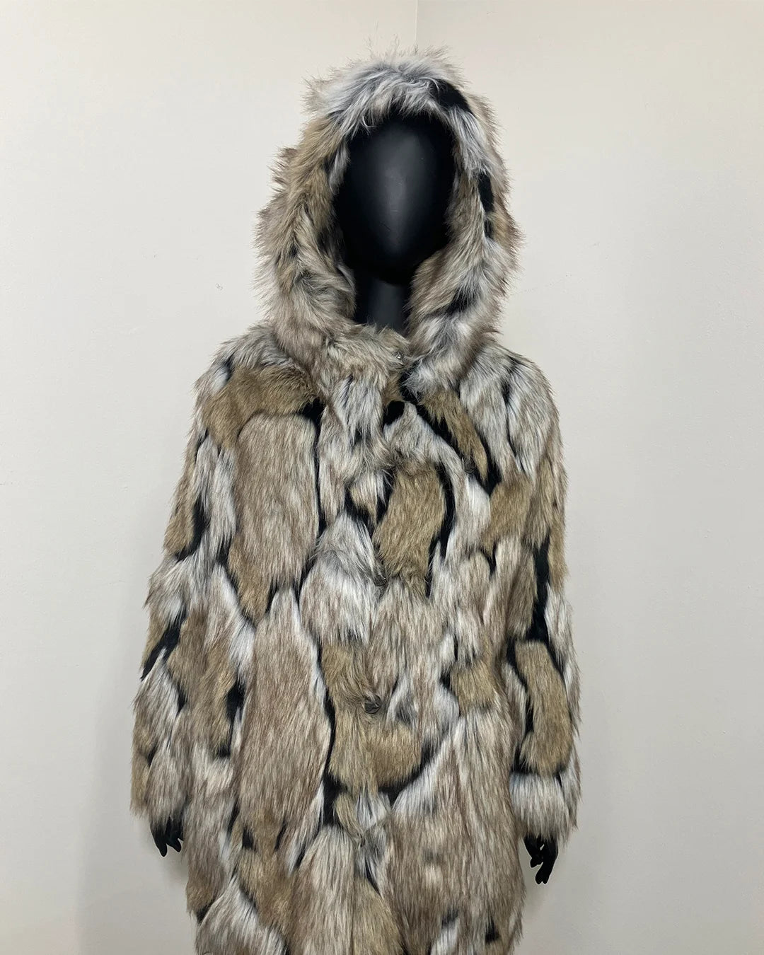 SpiritHoods 100% Fake Fur Coat with a hood on a mannequin against a white background