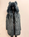 Gray/blue Faux fur coat with hood on a beige background