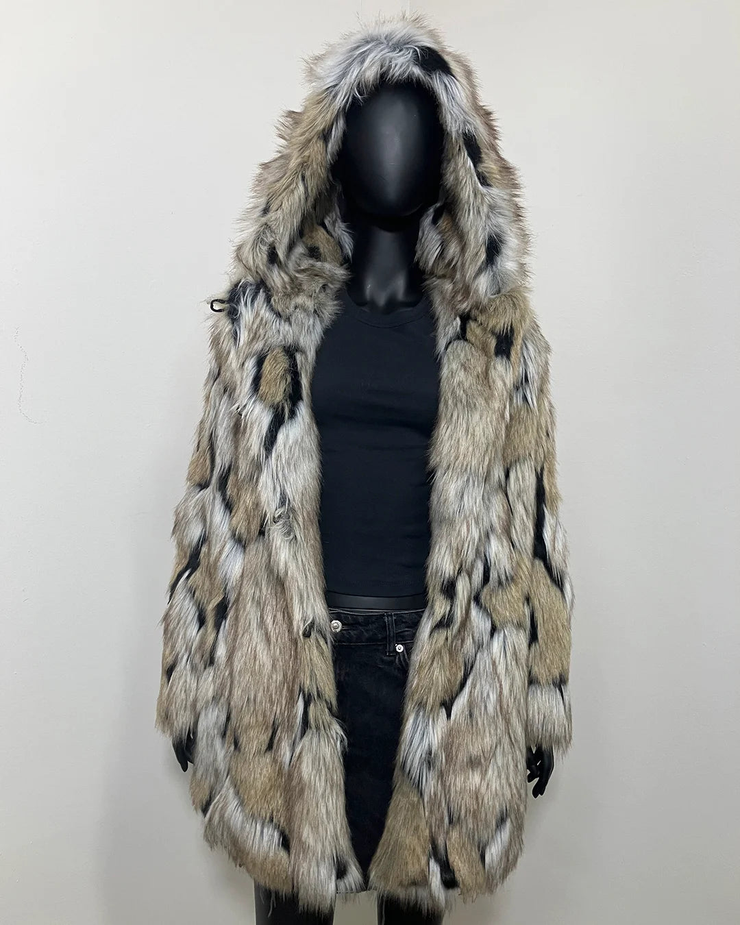 SpiritHoods Wolverine Faux Fur coat in size SMALL with an oversized hood on a mannequin against a white background