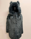 Dark gray/blue fake fur coat with hood on a beige background