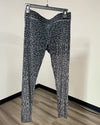 Gray leopard print velvet capri-style leggings on a black hnger.
