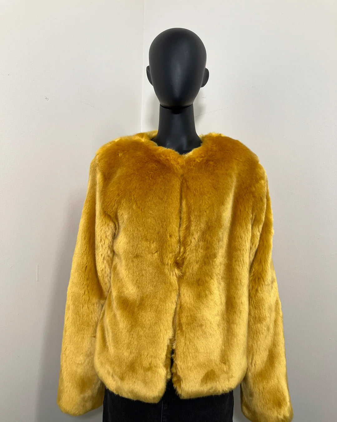 Yellow Luxe Faux Fur Bomber jacket on a black mannequin against a white background. SpiritHoods Online Sample Sale: one of a kind golden wolf faux fur bomber in luxe tissavel yellow fake fur in size MEDIUM.
