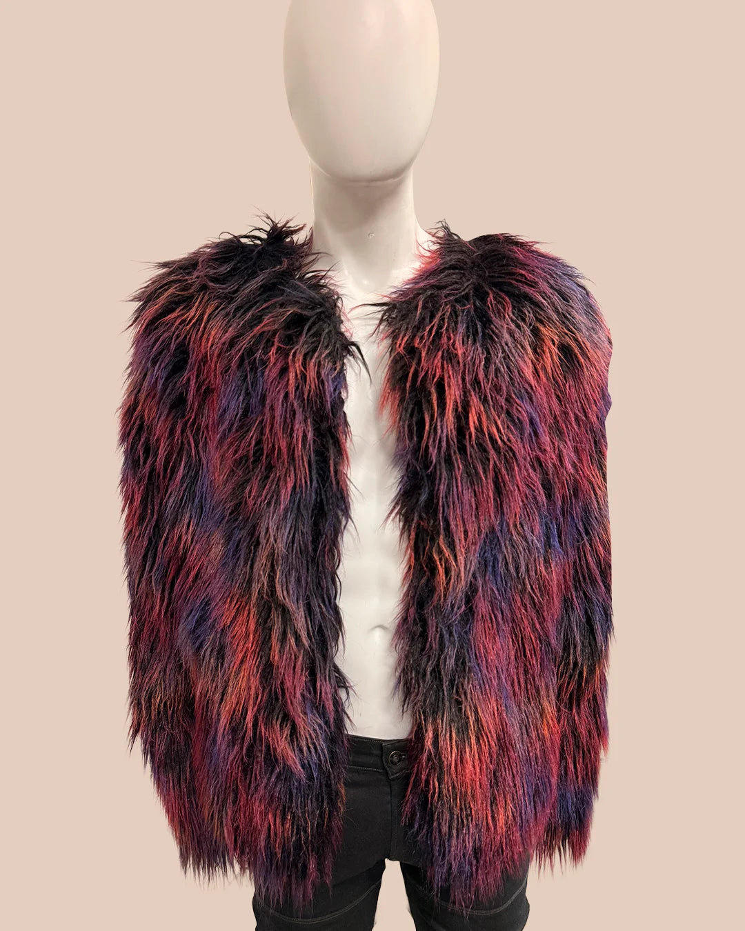 Multicolored fake fur bomber jacket on a mannequin against a beige background