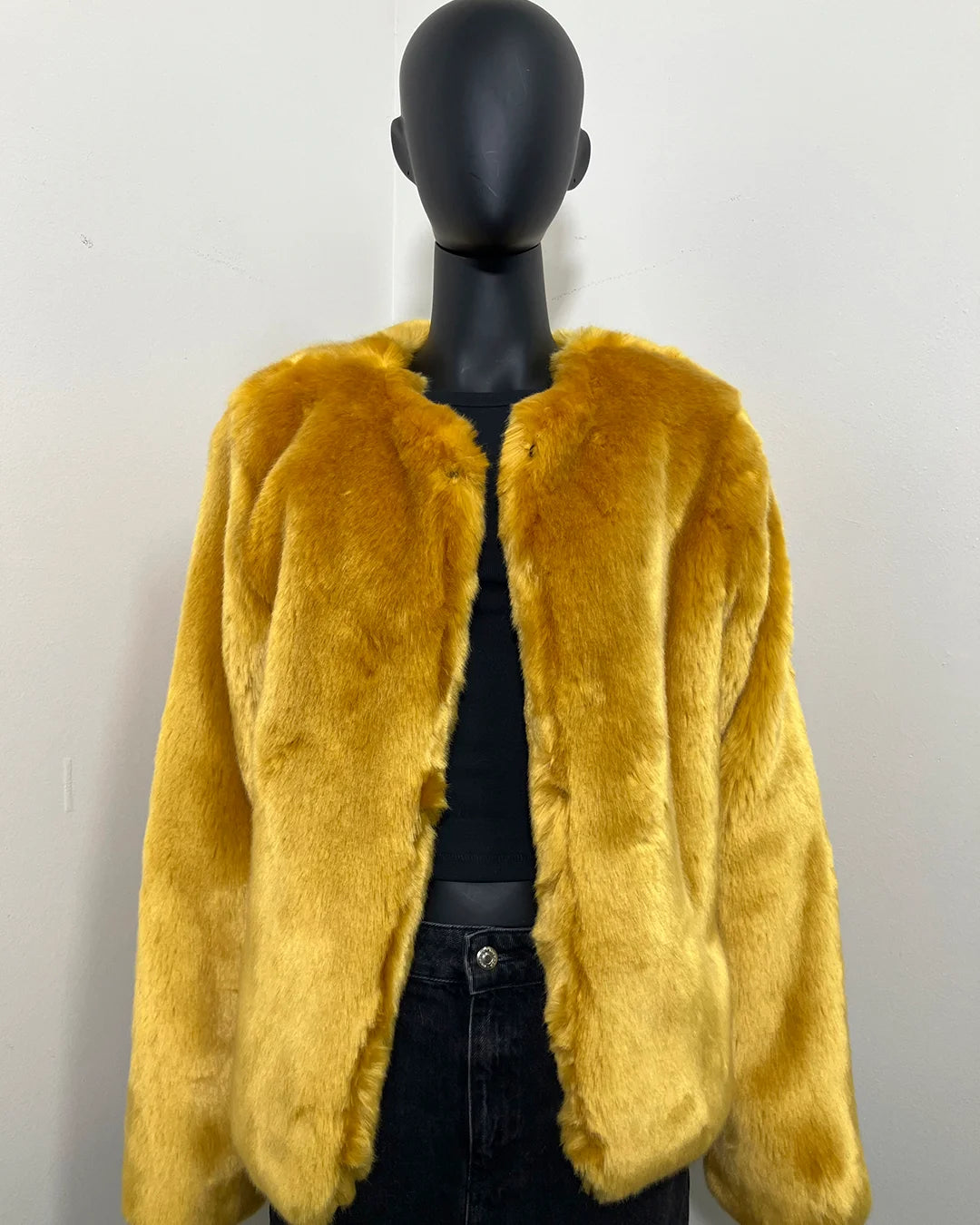 Yellow Luxe Faux Fur Bomber jacket on a black mannequin against a white background. SpiritHoods Online Sample Sale: one of a kind golden wolf faux fur bomber in luxe tissavel yellow fake fur in size MEDIUM.