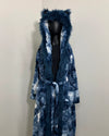 Blue tie-dye robe with fake fur hood on a mannequin against a plain background