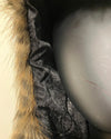 Close-up of a textured fabric with fur trim. Showing slight rusching in inner liner, on wearer's right side where the faux fur meets the inner liner. SpiritHoods Online Sample Sale Savannah Cat Classic Faux Fur Bomber Jacket in Size Medium