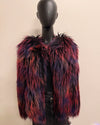Multicolored fake fur jacket on a mannequin against a beige background