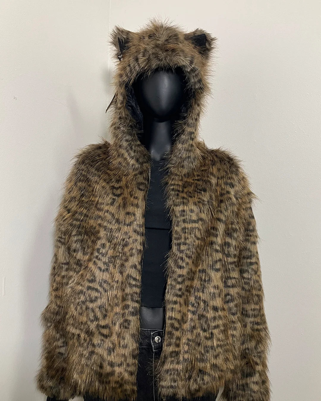 Leopard print fake fur bomber jacket with zipper closure and a hood with feline ears on a mannequin against a white background. SpiritHoods Online Sample Sale Savannah Cat Classic Faux Fur Bomber Jacket in Size Medium