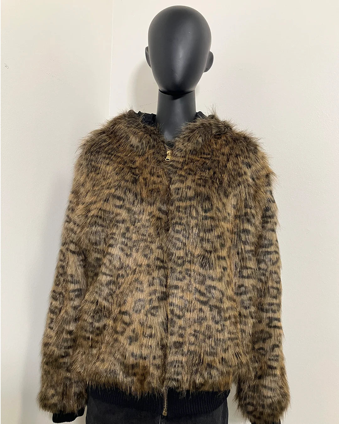 Leopard print 100% fake fur jacket with zipper closure and black ribbing on a mannequin against a white background. SpiritHoods Online Sample Sale Savannah Cat Classic Faux Fur Bomber Jacket in Size Medium