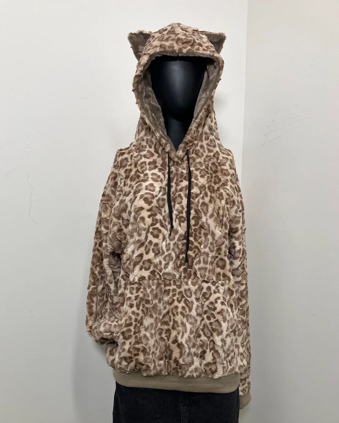 mannequin wearing SpiritHoods Faux Fur Hoodie in tan leopard with front kangaroo pouch pocket and fitted hood with tiny cat ears