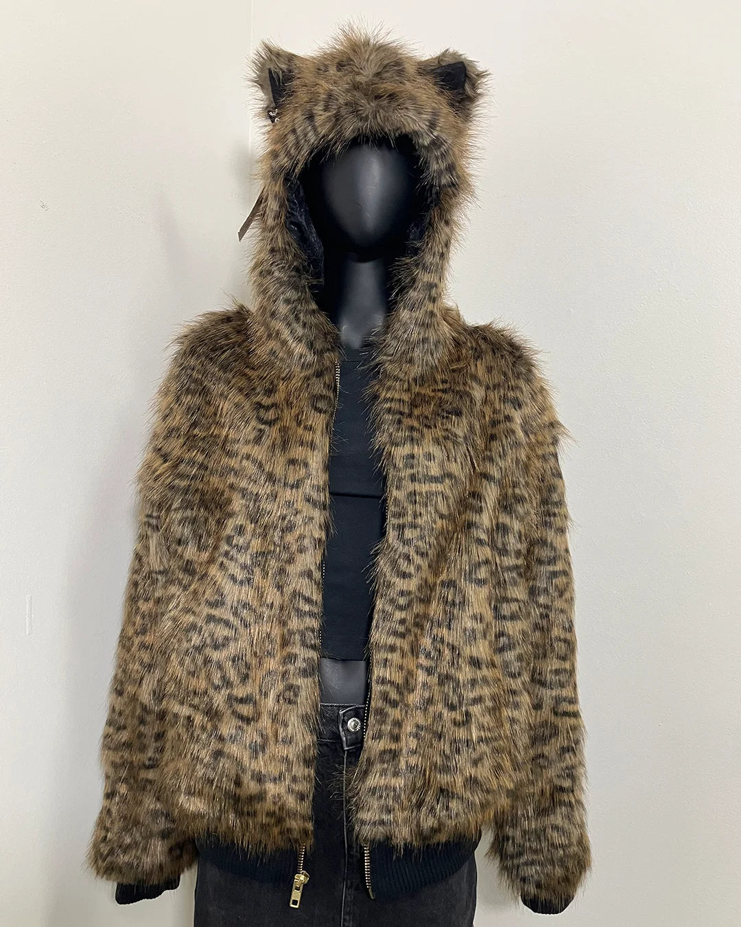 Leopard print faux fur bomber jacket with hood and ears on a mannequin against a white background. SpiritHoods Online Sample Sale Savannah Cat Classic Faux Fur Bomber Jacket in Size Medium
