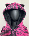 close up photo of the mannequin wearing the Raspberry Tiger Hoodie, with the hood on showing the tiny ears and inner black plush fabric lining the hood.