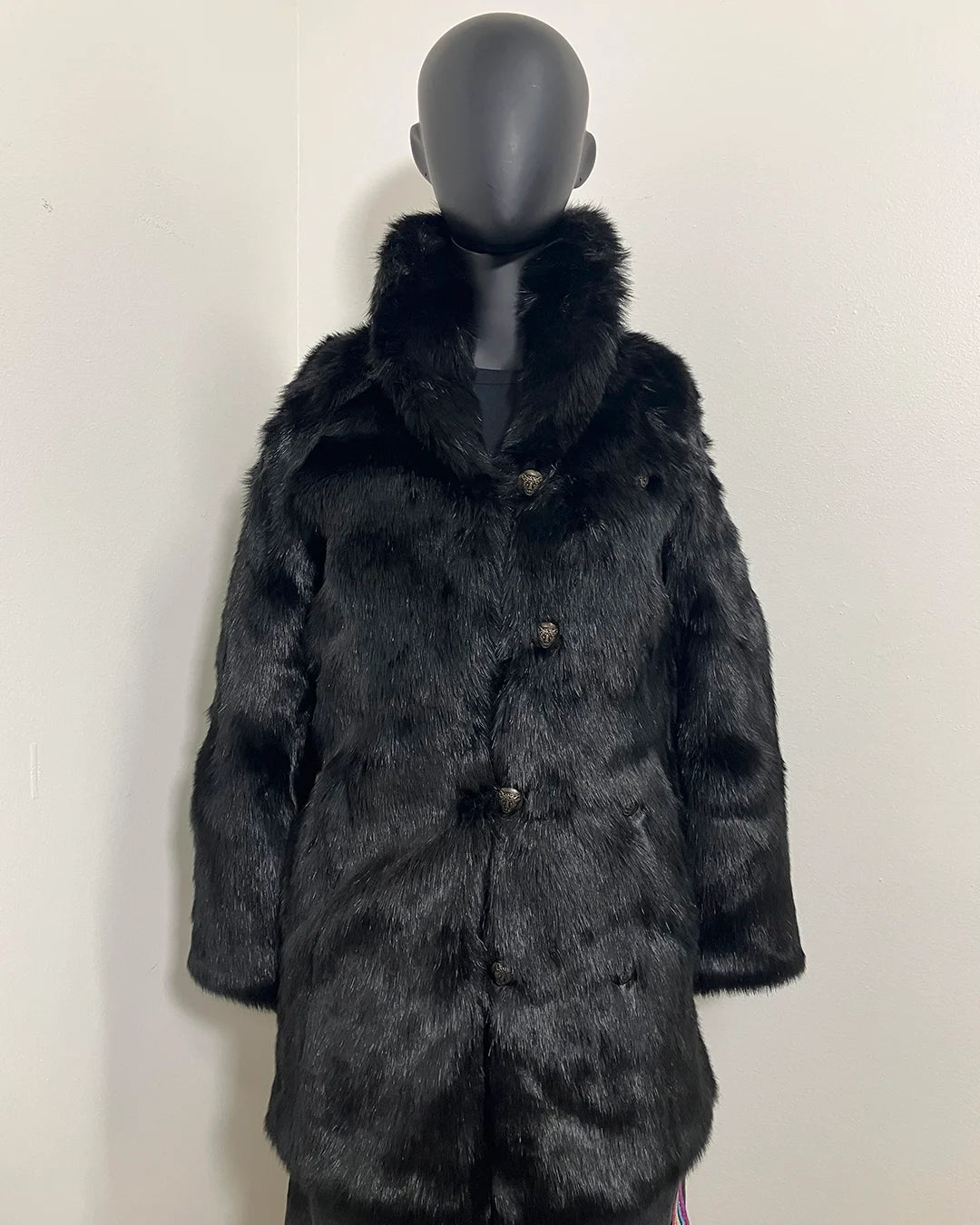 Mannequin wearing a black faux fur collared coat against a plain background | SpiritHoods Online Sample Sale Style: Faux Fur Coat in Black Panther Size XXS