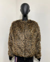 Leopard print jacket on a mannequin against a white background, 100% fake fur prototype sample jacket in size small with front zipped up