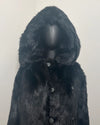All Black Faux Fur Coat with an oversized hood, up close photo of the top button and hood on the mannequin and sleek black short-pile, fake fur. SpiritHoods Online Sample Sale Style: Hooded Faux Fur Coat - Black Panther in Size X-SMALL