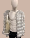 Mannequin wearing a silver fake fur bomber jacket with ivory poly-satin lining on a beige background