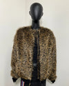 Mannequin wearing a leopard print faux fur coat against a white background in a size small with front zipper closure