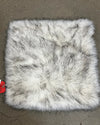 17x17 faux fur pillow with a white fake fur base with black tips giving a husky faux fur look.
