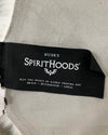 Husky Spirithoods label on a product on the gray suede husky rug backing