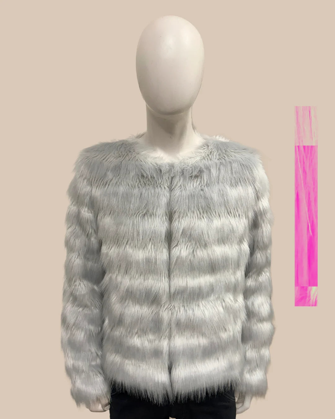 Mannequin wearing a gray fluffy fake fur jacket on a beige background