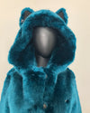 Royal Blue/Teal faux fur coat with wolf ears on a mannequin against a beige background. SpiritHoods Online Sample Sale Product: Classic Faux Fur Coat in Royal Wolf in XXS 