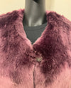 Close-up of the Lavender Wolf V-neck faux fur around the neck/collar on a mannequin with a beige background
