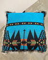 Decorative pillow with geometric pattern on a textured surface