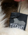 Close-up of a Tissavel label on a fur product
