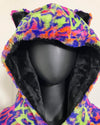 Mannequin head wearing a colorful neon leopard print tie-dye inspired hoodie with black lining.