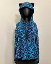 Blue leopard print hoodie with cat ears on a mannequin against a beige background