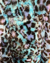 Close-up of a textured fabric with a multicolor pattern