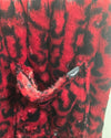 close-up photo of the seam splitting near the pocket on the back part of the lounge pants