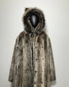Fake Fur coat with hood on a mannequin against a plain background