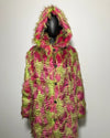 Colorful hooded coat with pink and green faux fur feather inspired pattern on a mannequin against a plain background